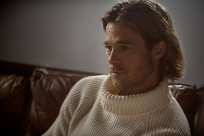 man in white sweater