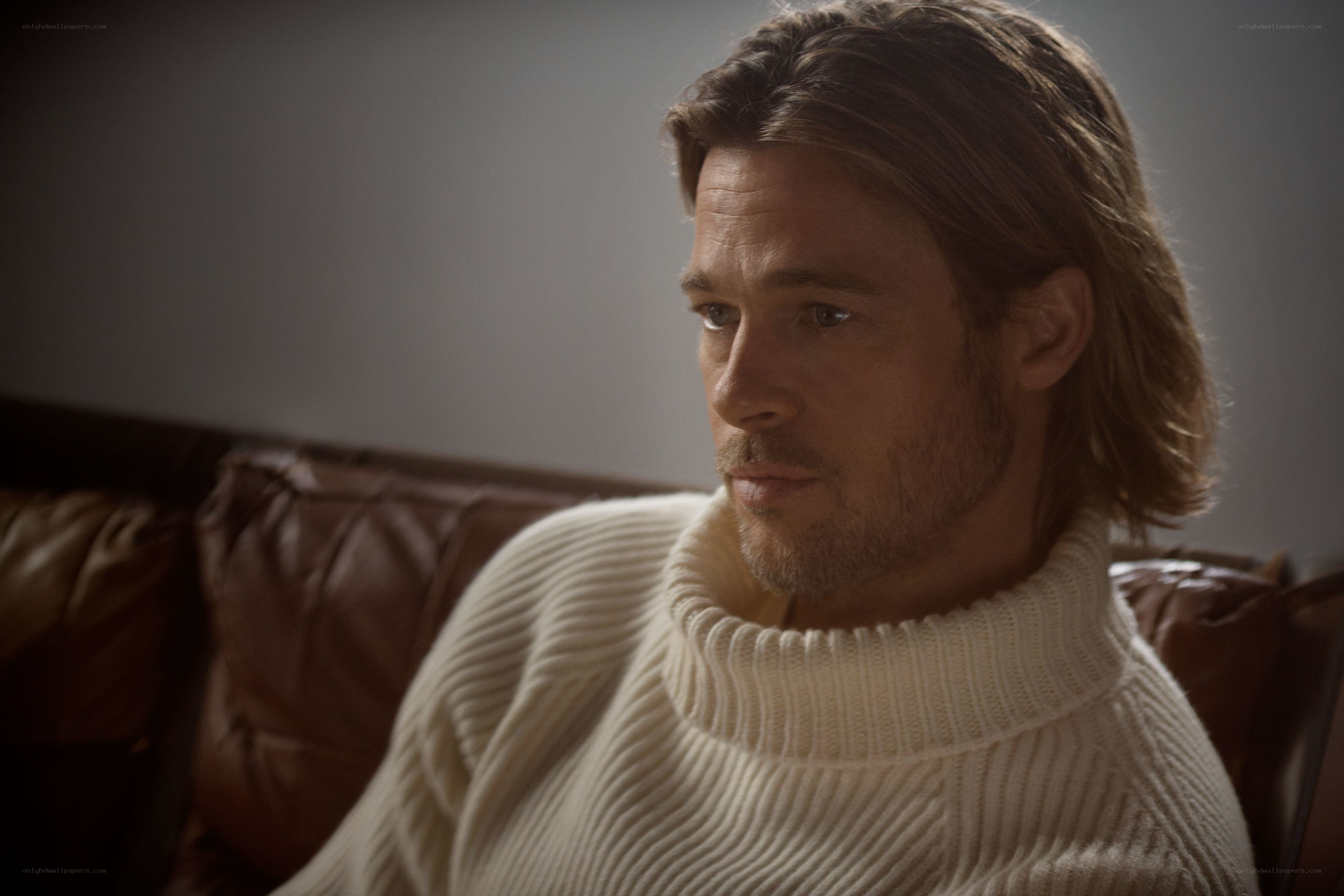 man in white sweater