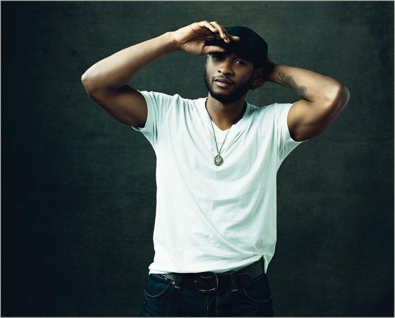 man in white t-shirt and cap