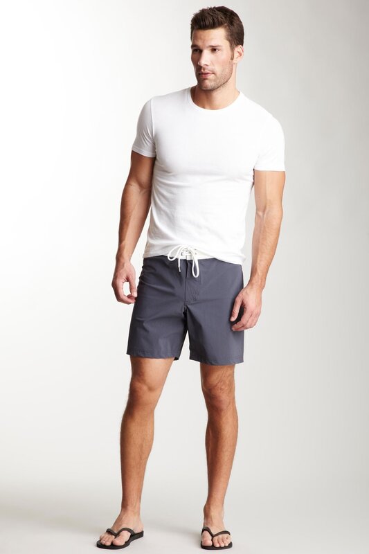 man in white t-shirt and shorts
