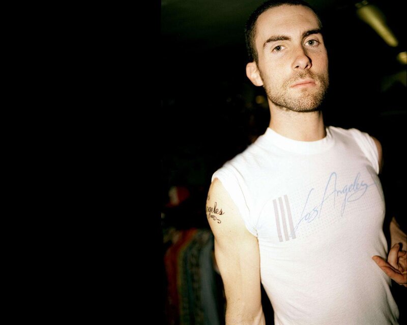 Man in White T-shirt — Serious