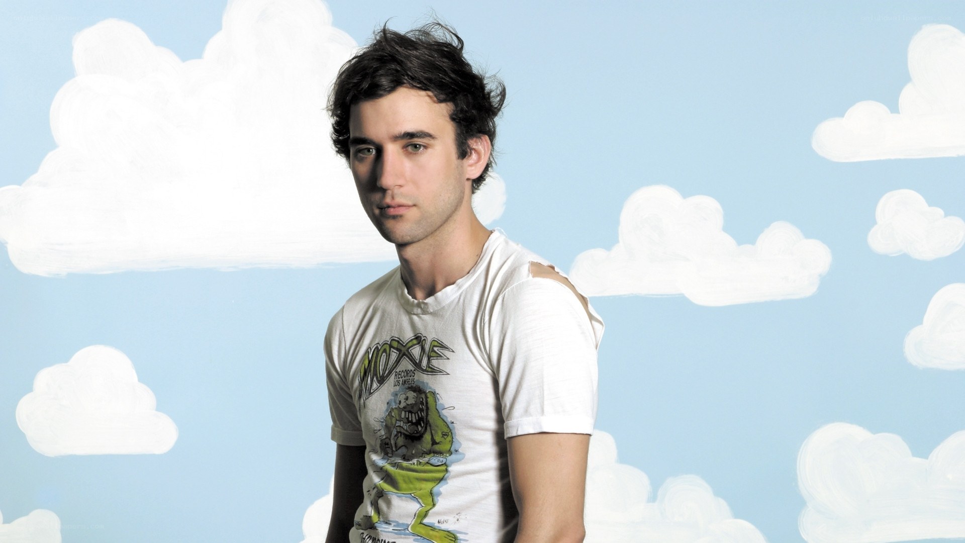 man in white t-shirt with clouds