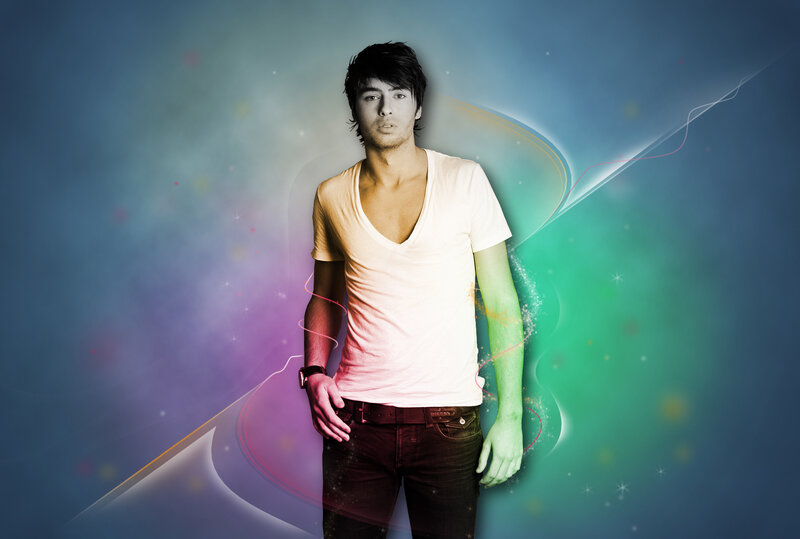man in white t-shirt with colorful background