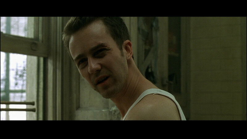 man in white tank top