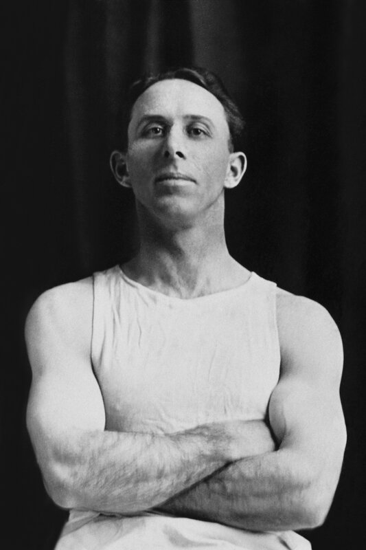 man in white tank top