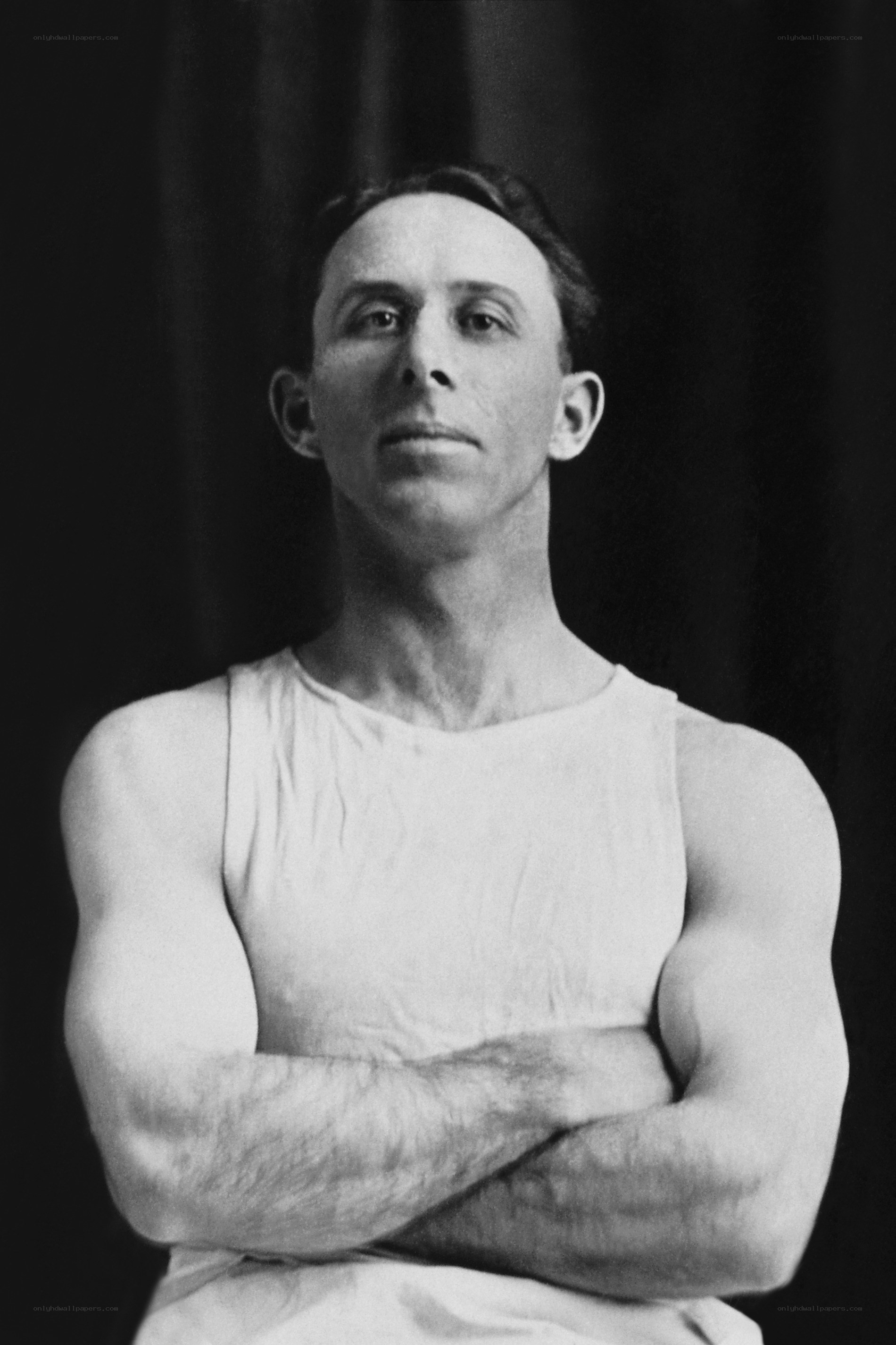 man in white tank top