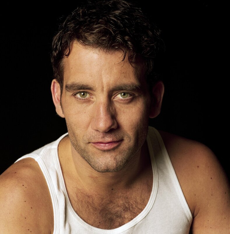 man in white tank top