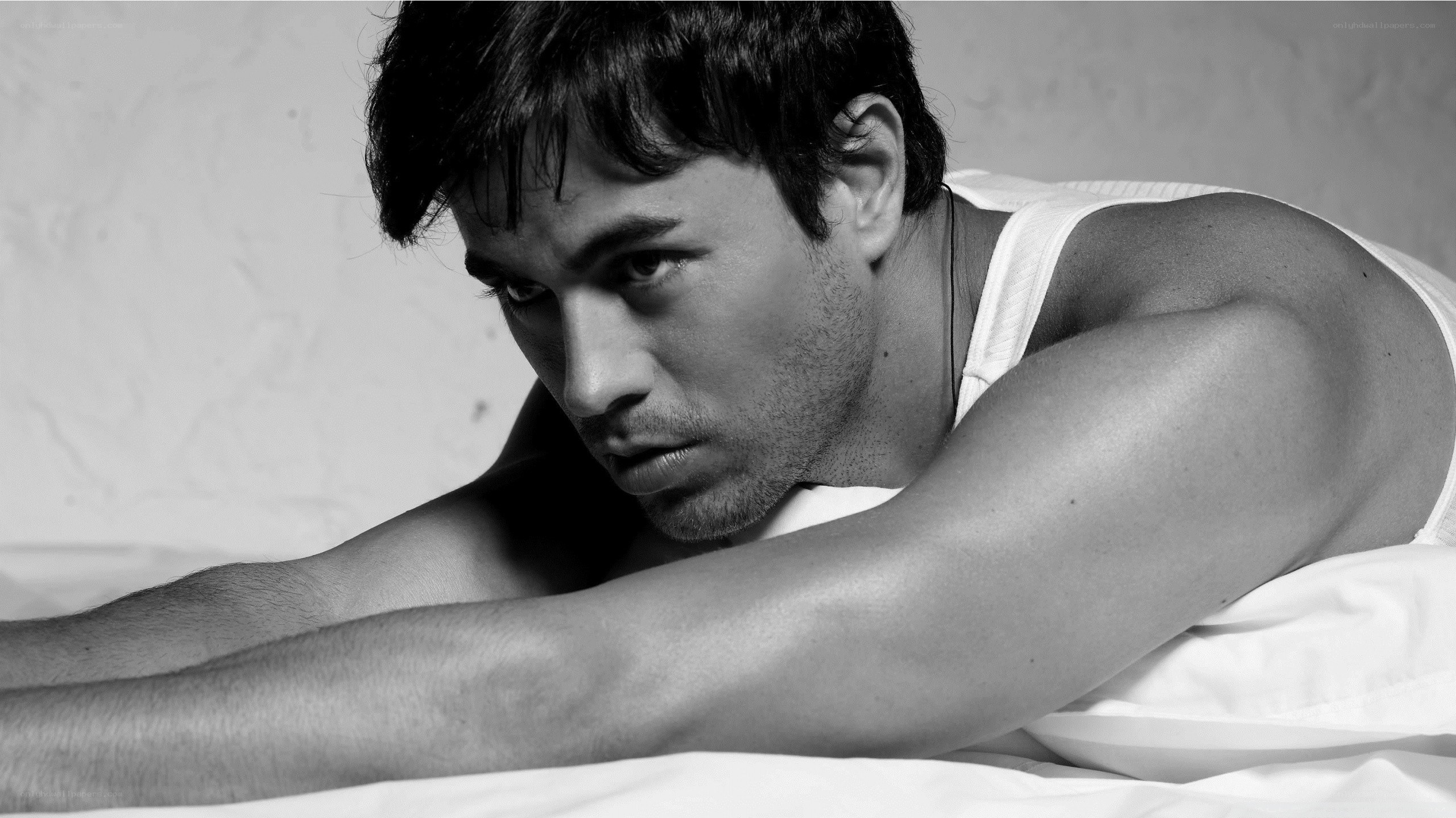 man in white tank top