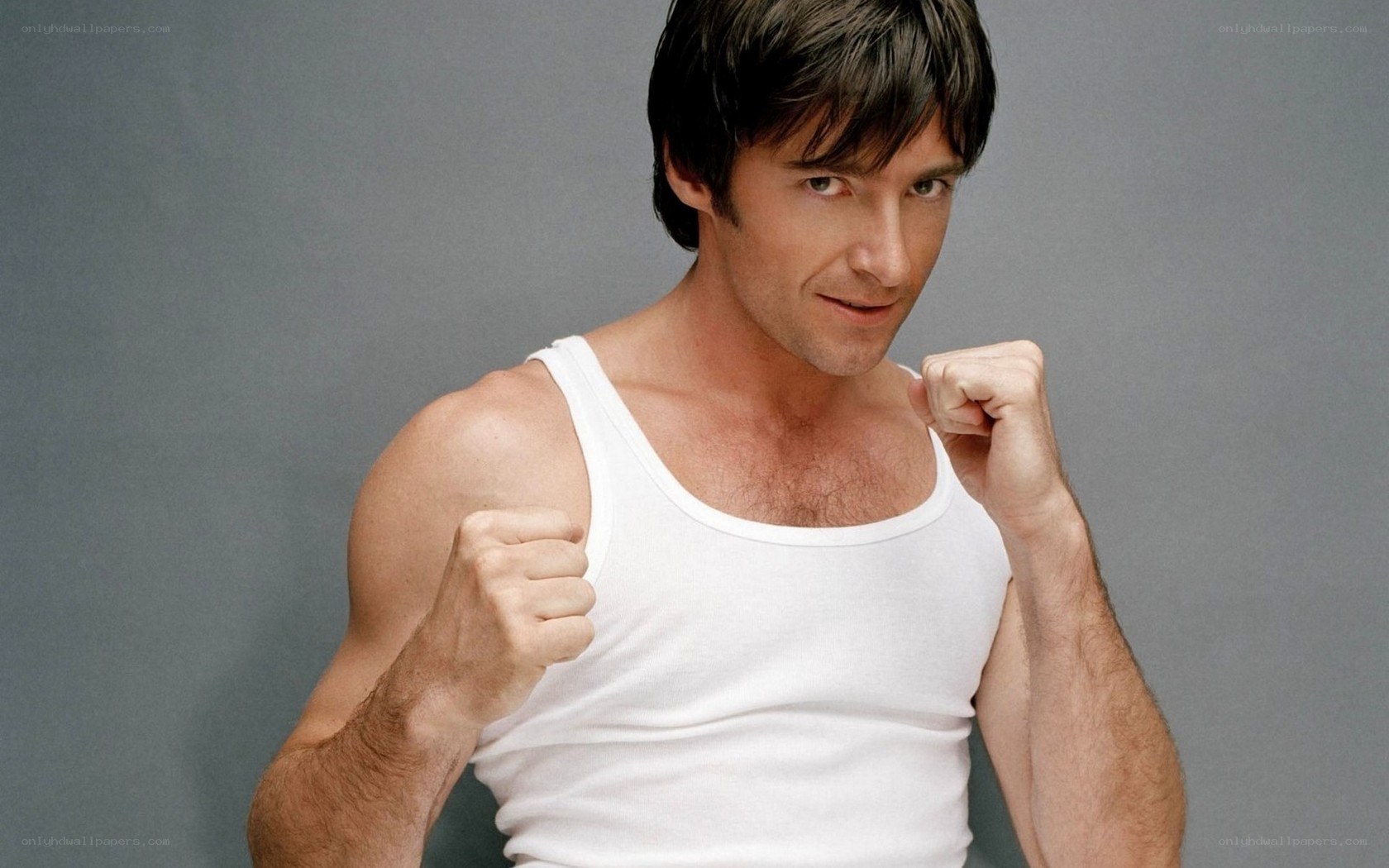 man in white tank top
