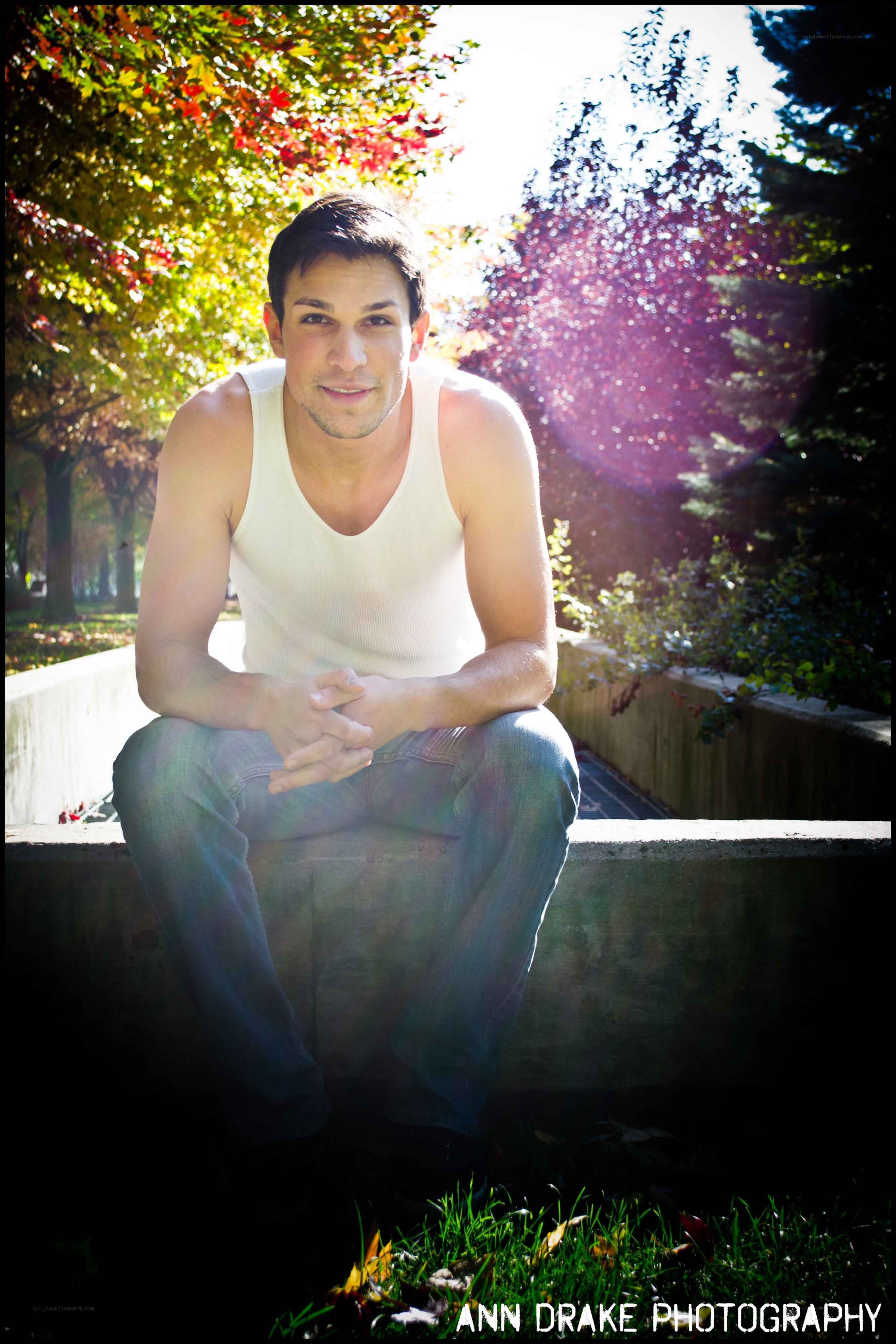 man in white tank top