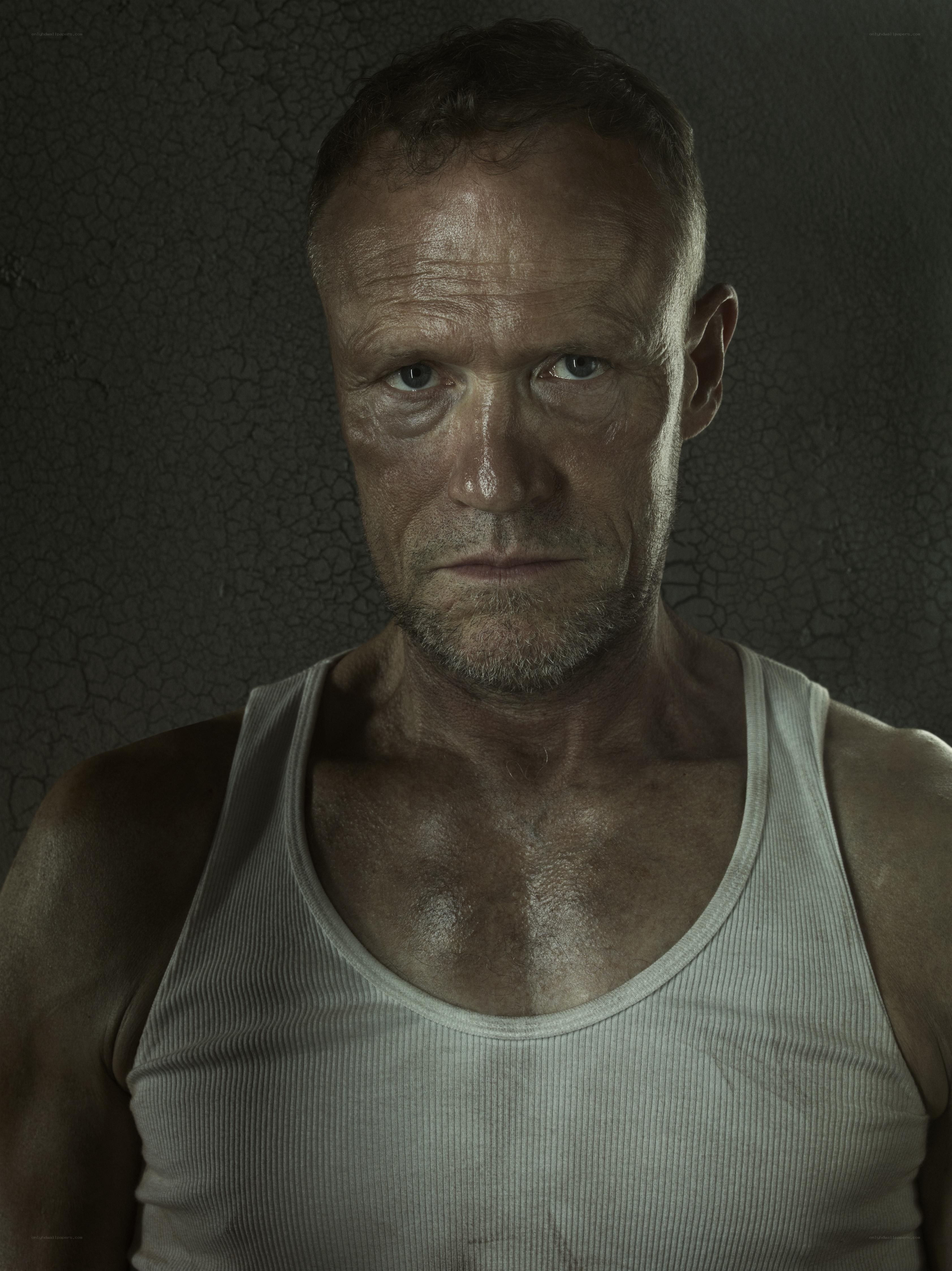 man in white tank top