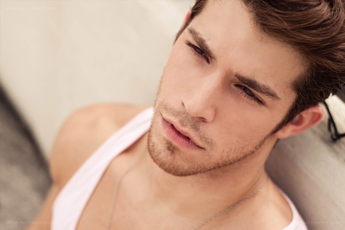 man in white tank top
