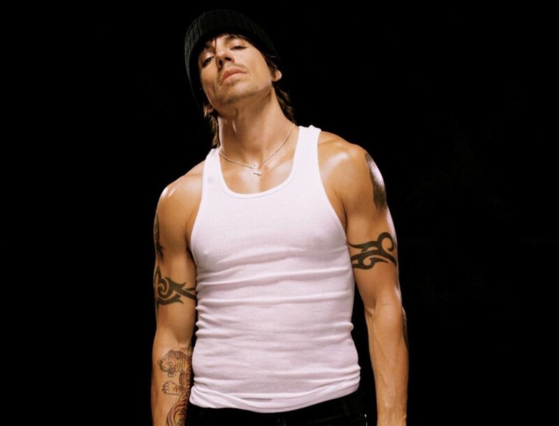 man in white tank top