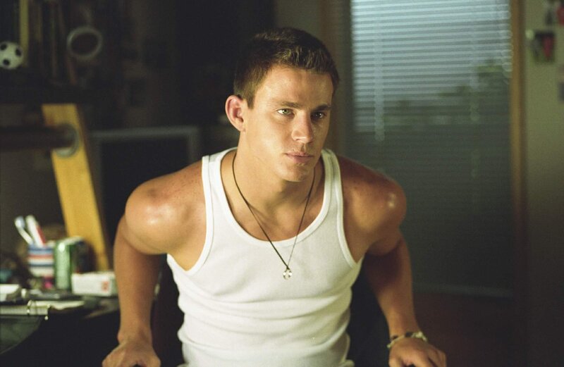 Man in White Tank Top — Serious, Night