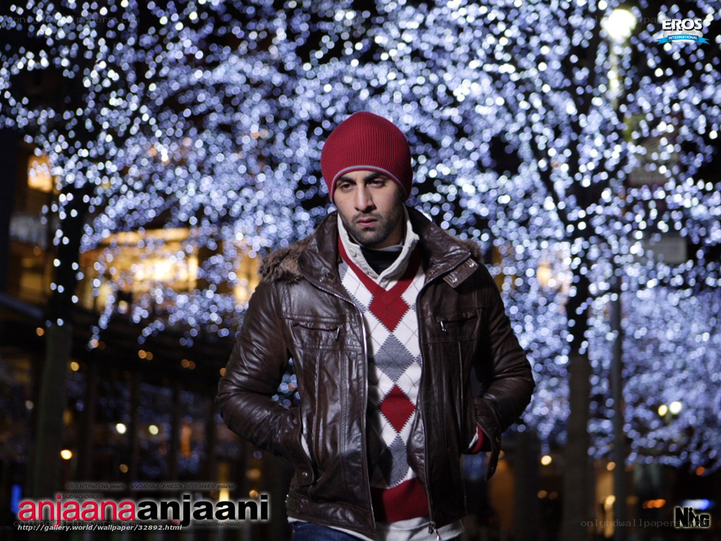 Man in winter clothes at night