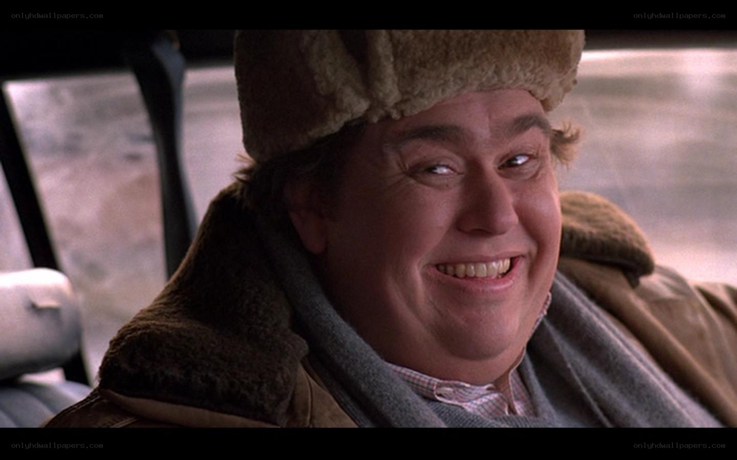 man in winter hat smiling