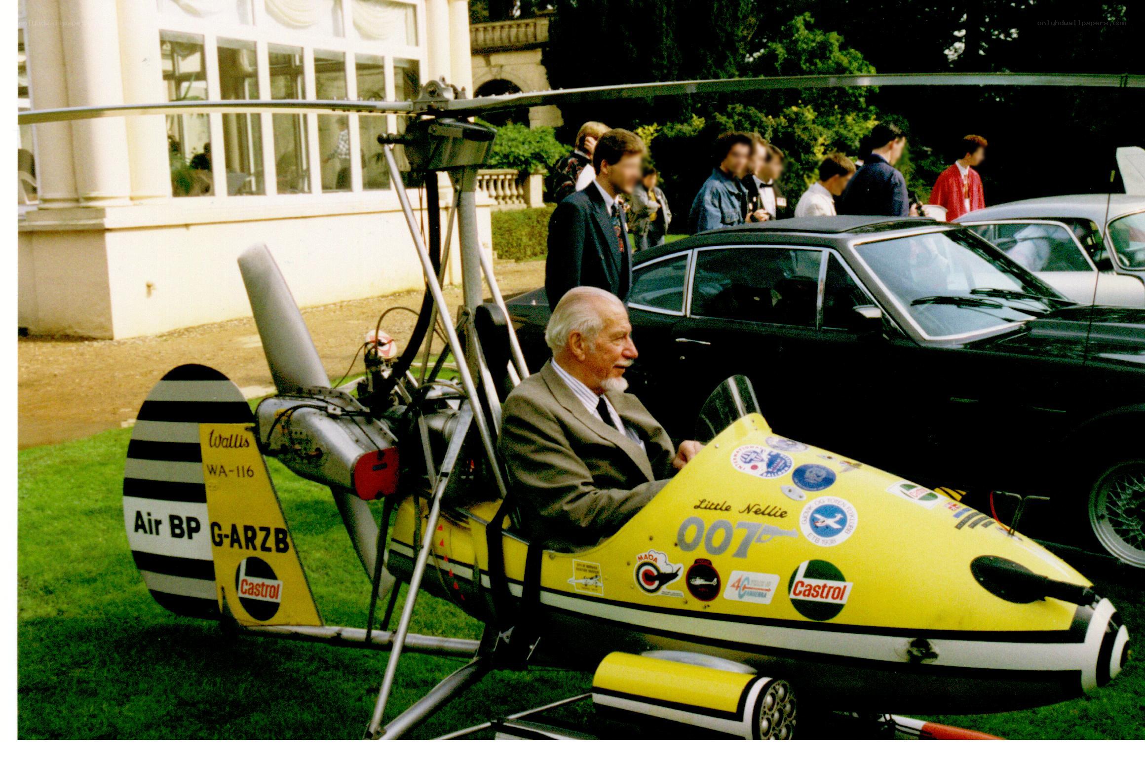 Man in yellow helicopter at event