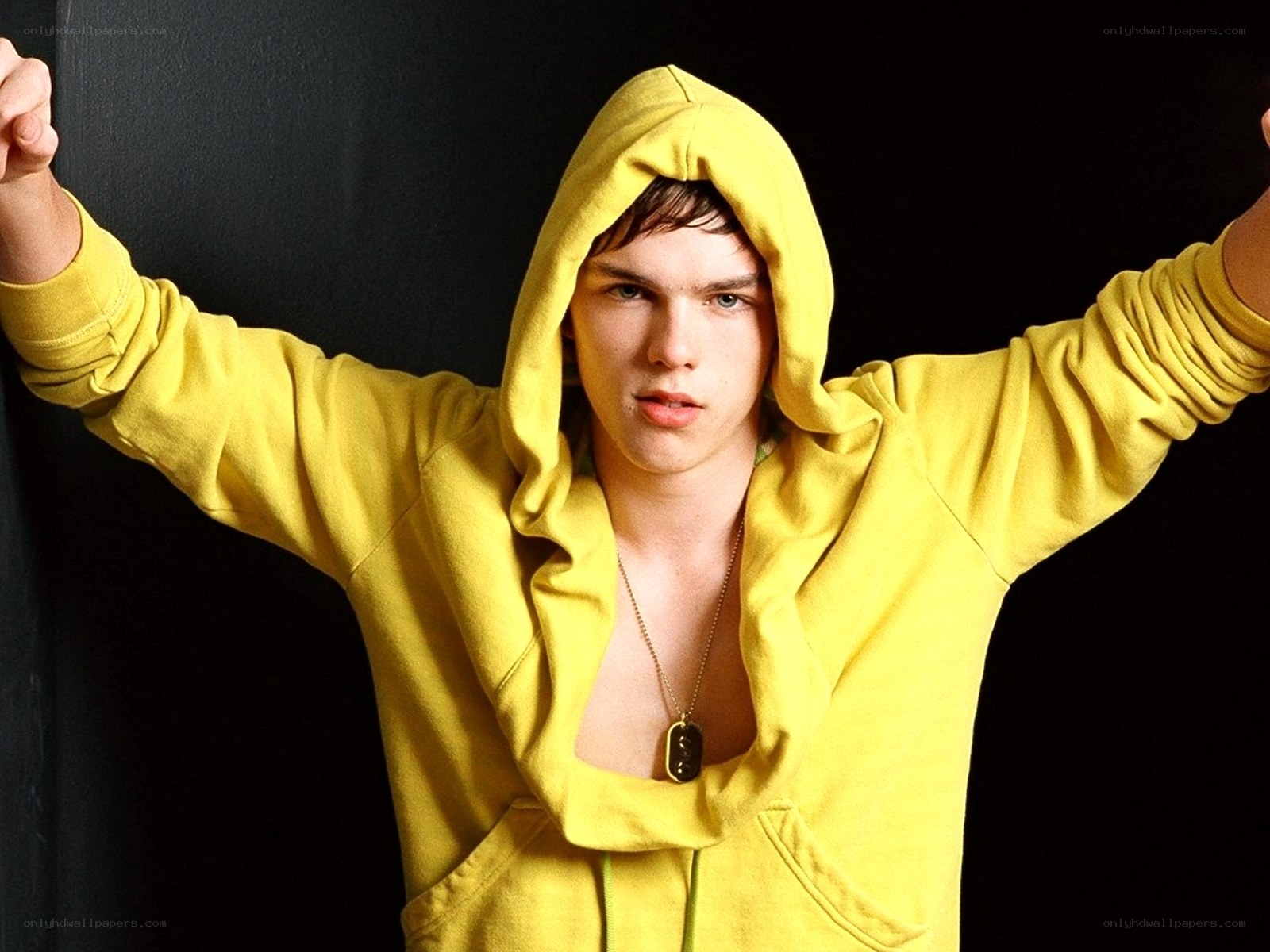 man in yellow hoodie
