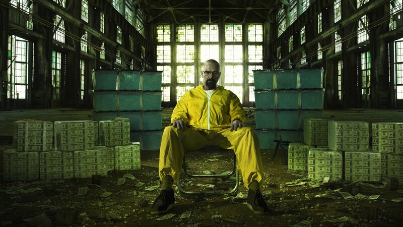 man in yellow suit with money