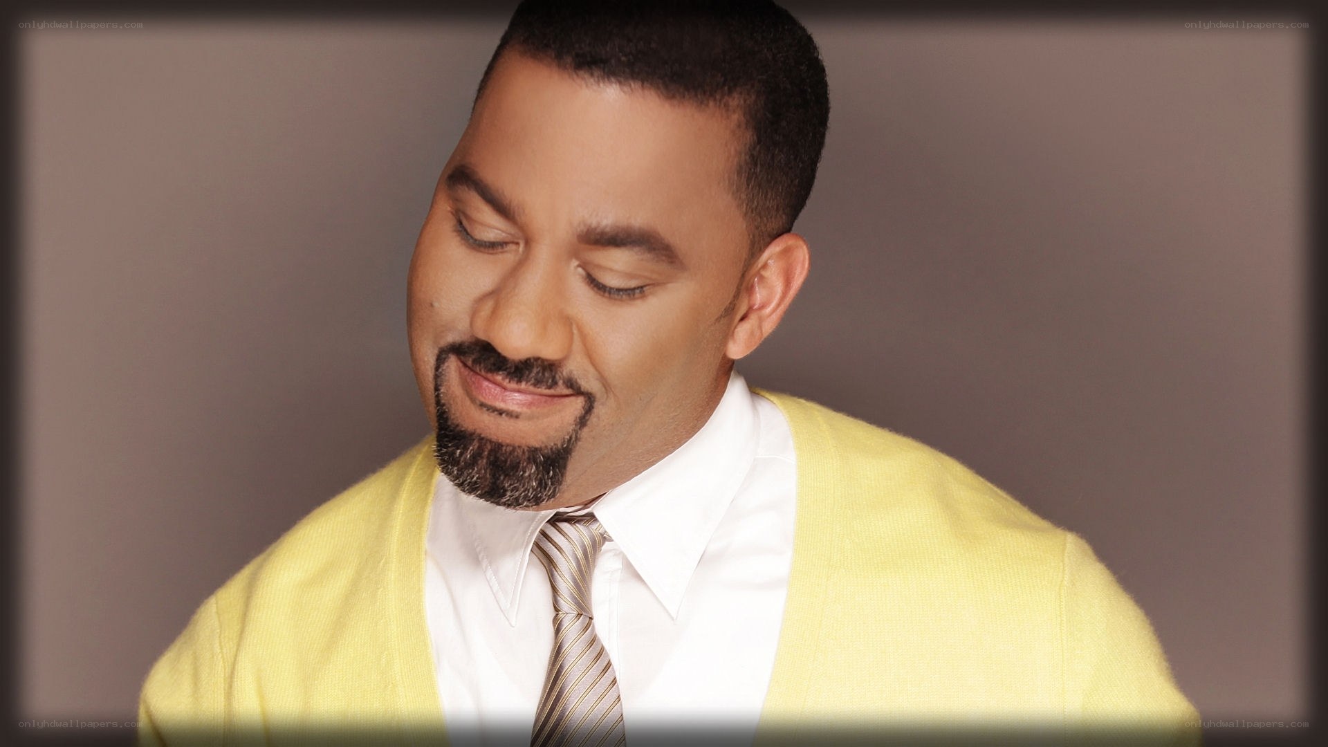 man in yellow sweater