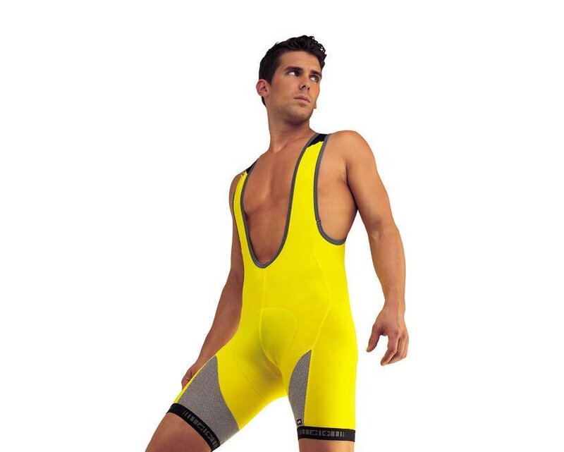 man in yellow wrestling singlet