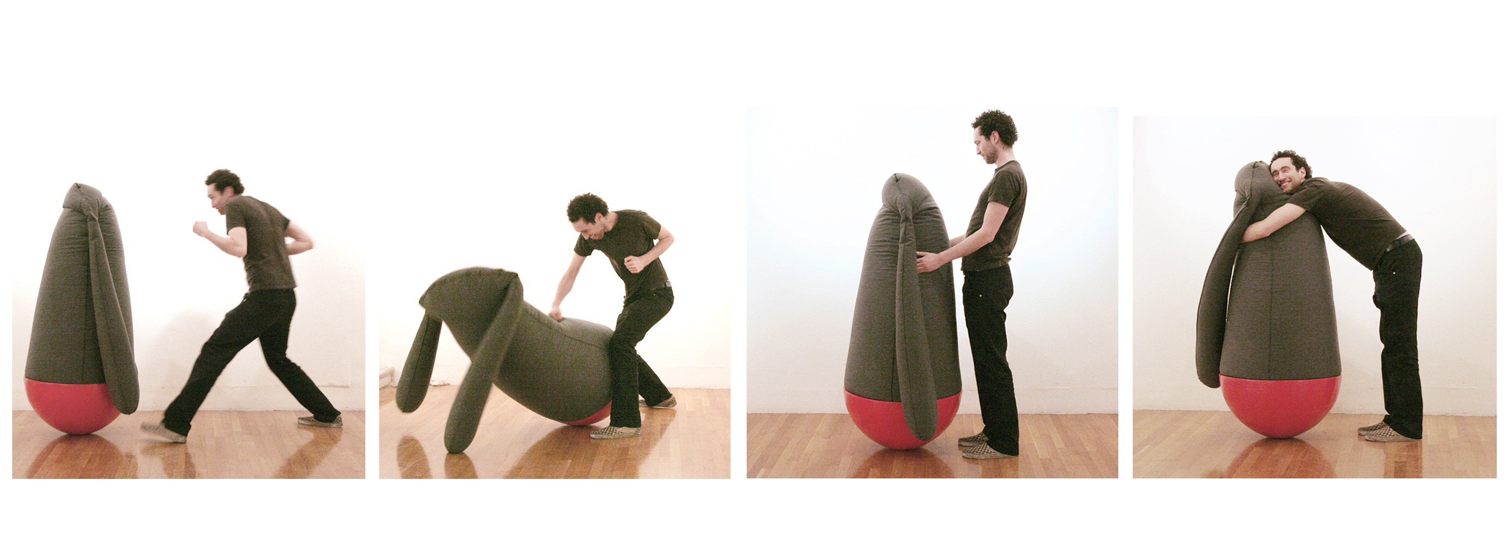 man interacting with beanbag sculpture