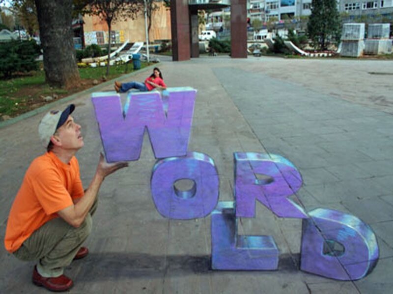 Man Interacting with Chalk Art