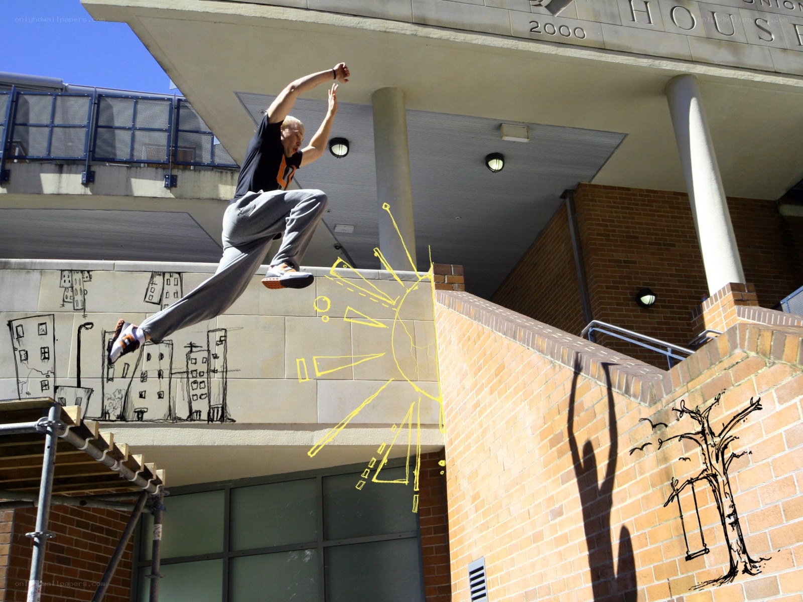 Man jumping between buildings