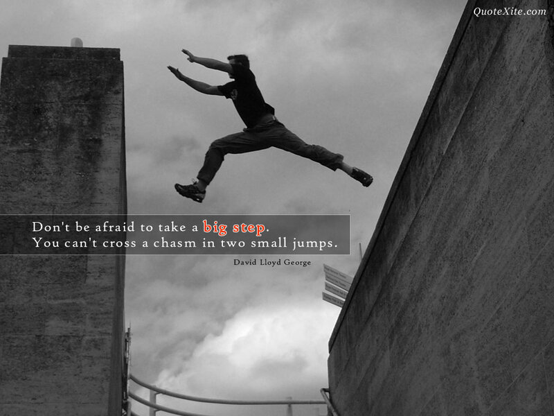 man jumping between buildings
