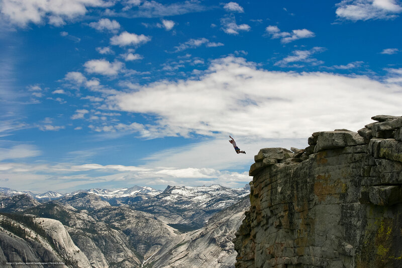 Man jumping from a cliff