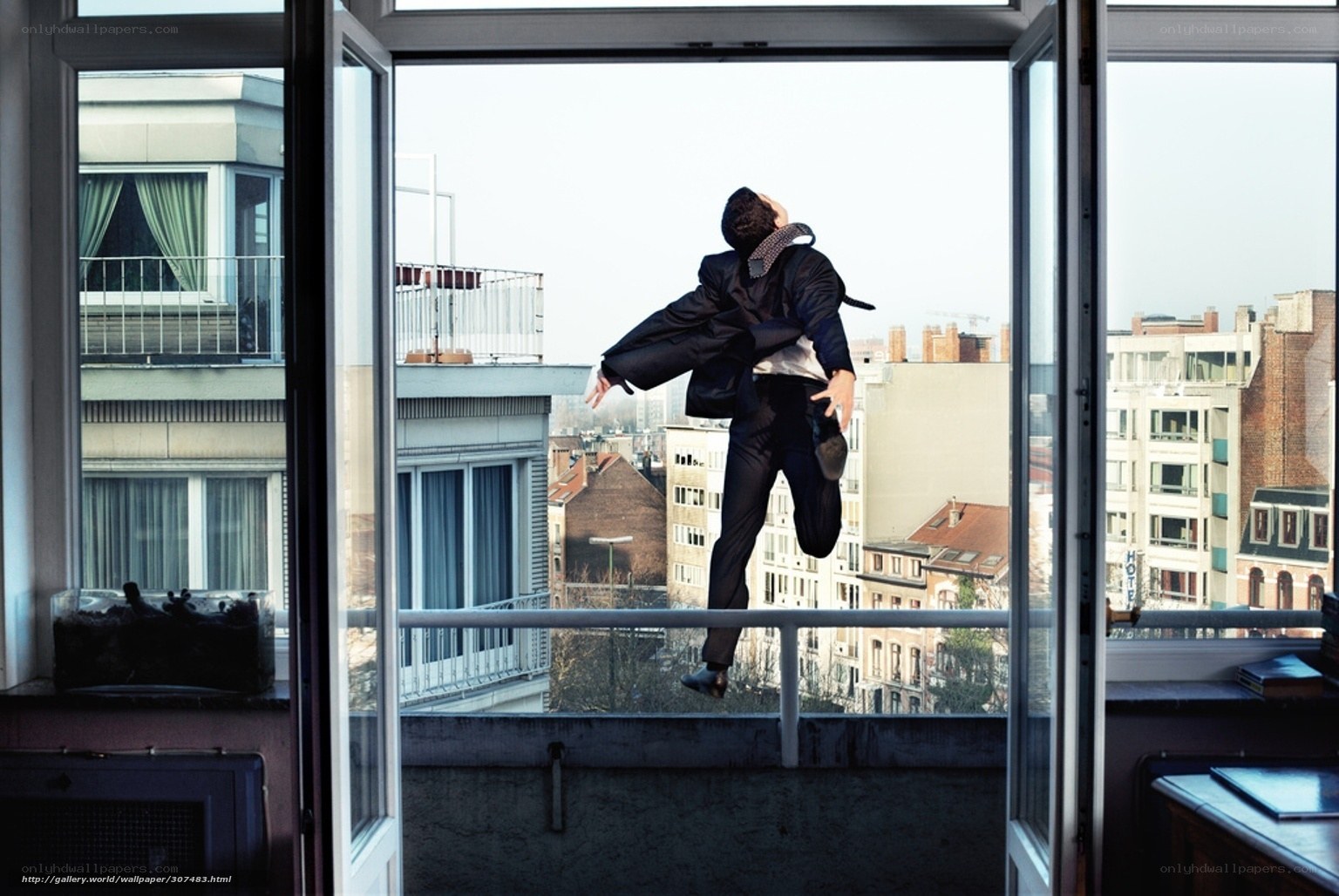 Man jumping from balcony