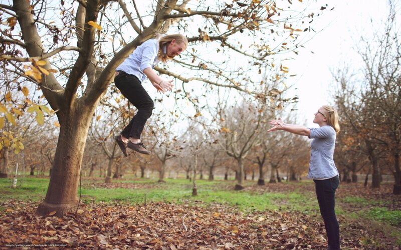 man jumping from tree