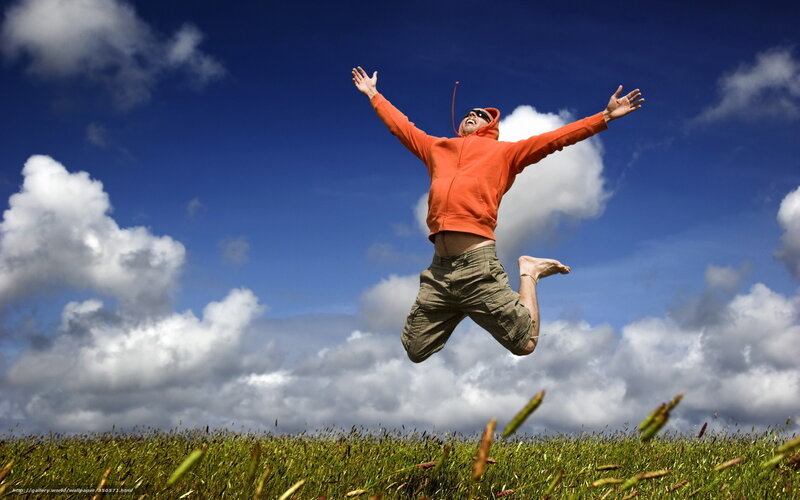 Man Jumping in Field