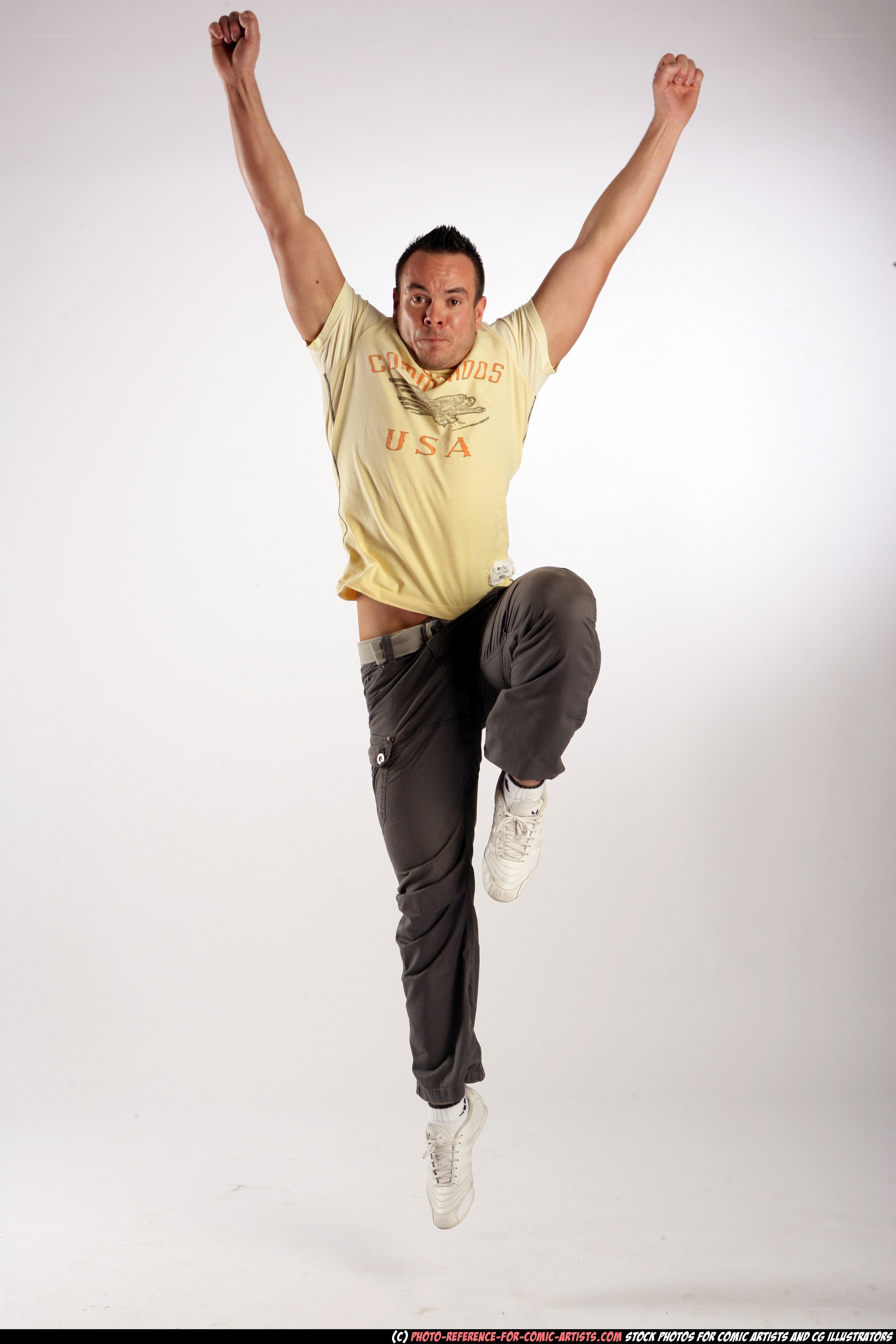 man jumping in studio