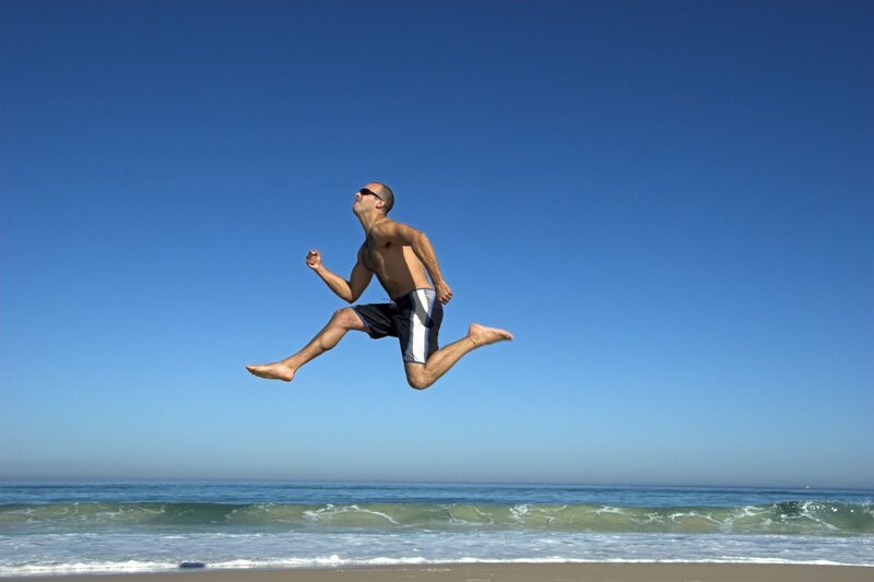 Man jumping on the beach