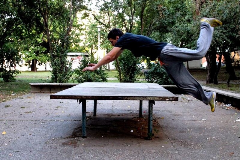 Man Jumping over Table — Green