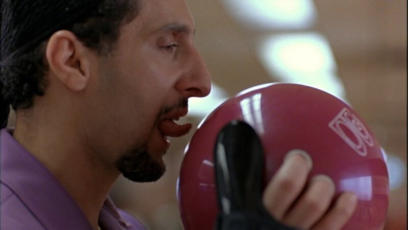 Man Kissing Bowling Ball