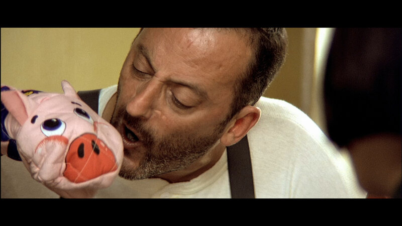 man kissing pig toy