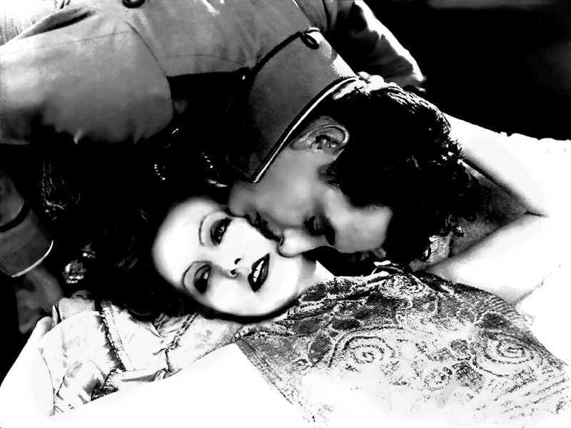 Man Kissing Woman