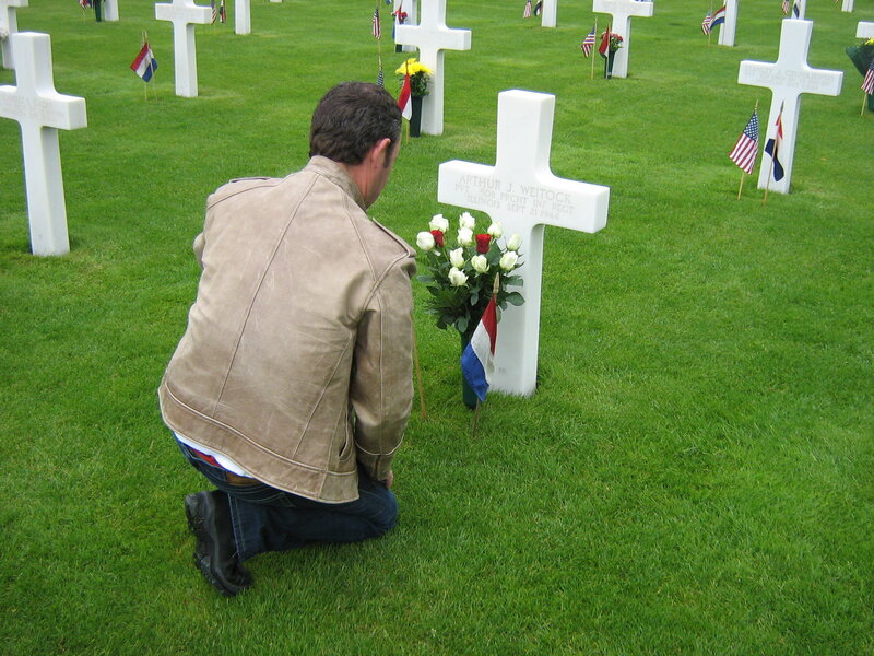 Man Kneeling at Grave — Green