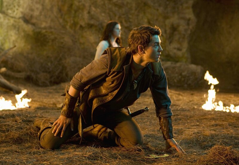 Man kneeling in a cave