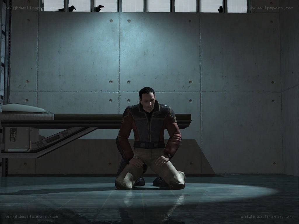man kneeling in a room