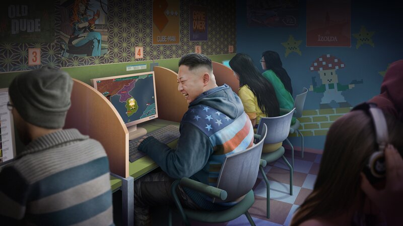 Man Laughing at Computer