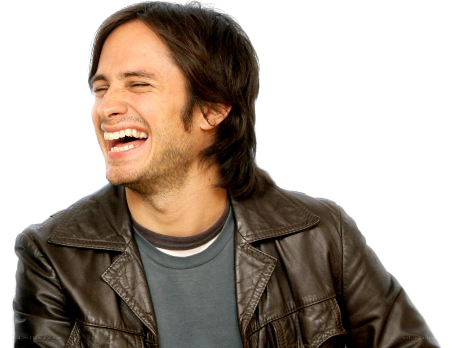 man laughing in leather jacket
