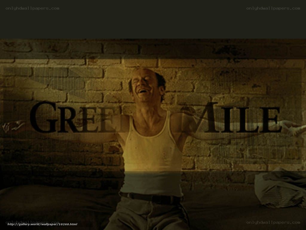 man laughing in prison cell