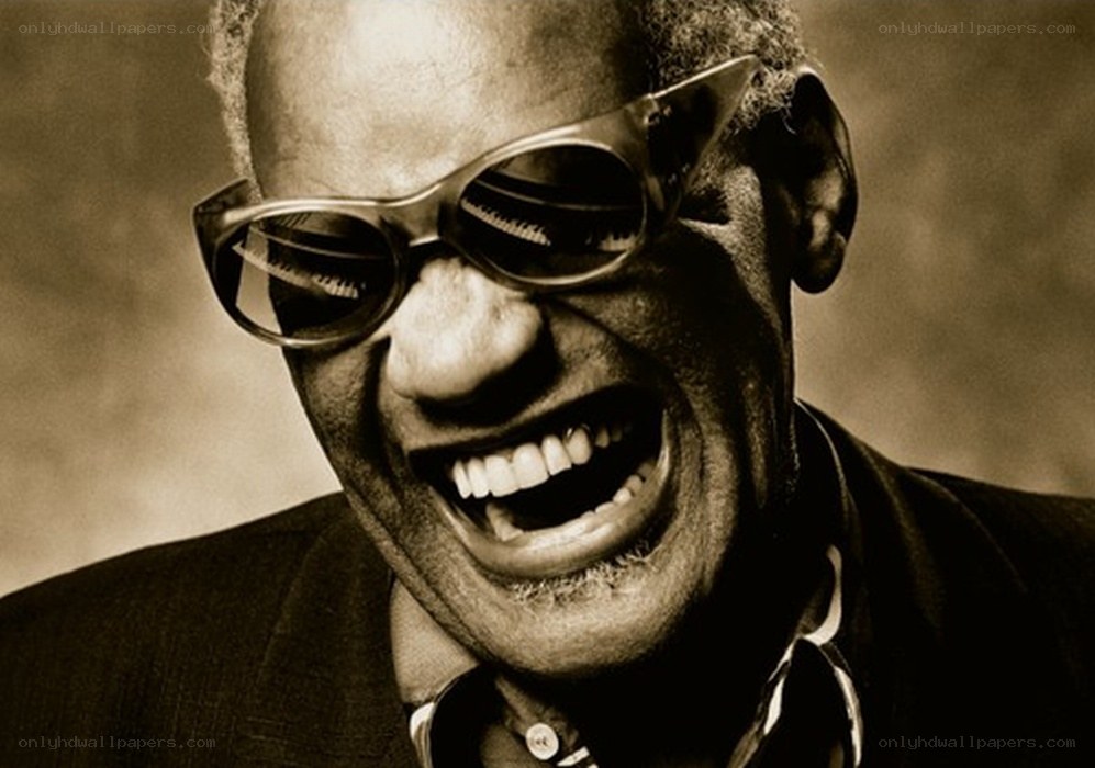 man laughing in sunglasses