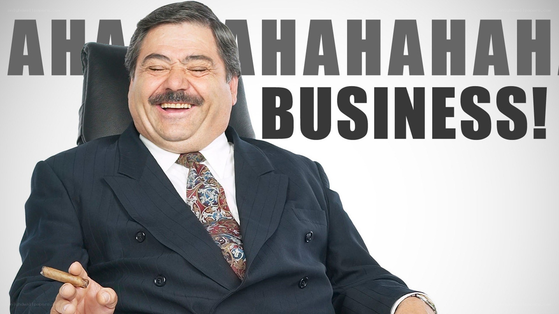 man laughing with cigar