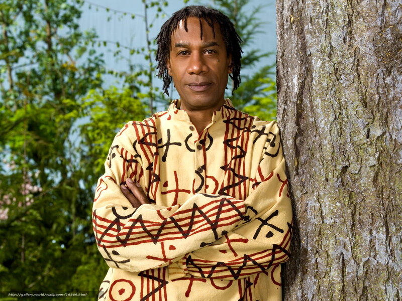 man leaning against tree