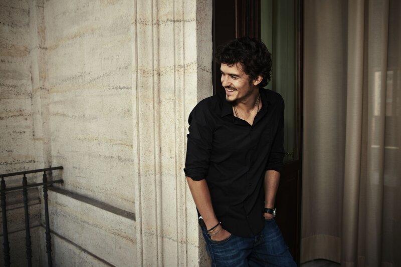 Man Leaning Against Wall — Black, Relaxed