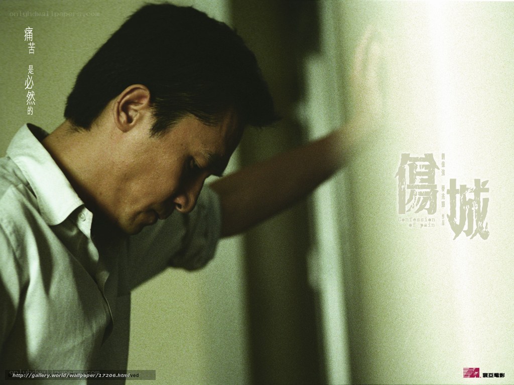 man leaning against wall
